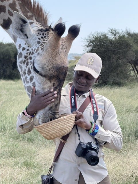 Bruno greeting a giraffe up close