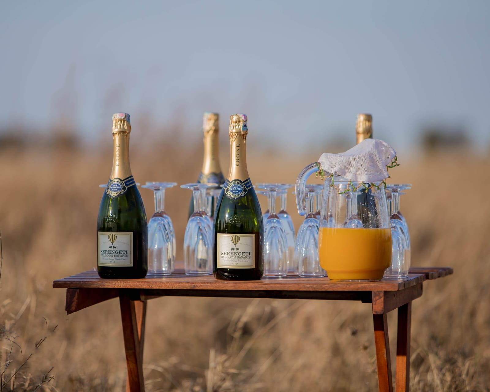 Champagne set out on the savanna after a balloon flight