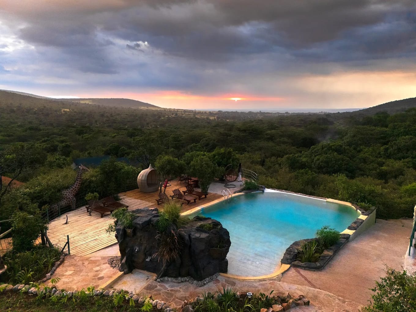Mara Enkaiji lodge and its pool among the trees, seen from above