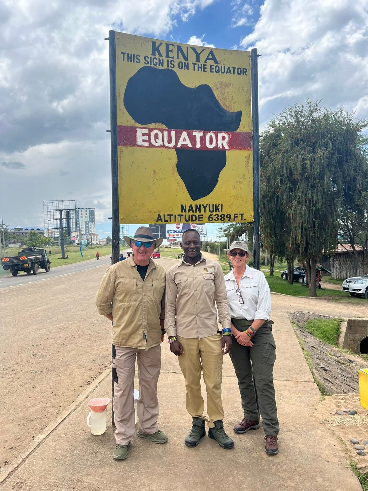 Nancy with Bruno at the Kenya Equator sign